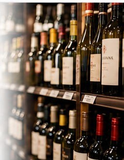 Wine bottles displayed inside ARC Liquor